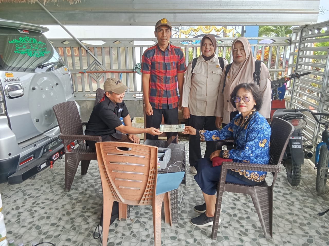 UPTD Pelayanan Pajak Pasangkayu dan Bapenda Pasangkayu Jemput Pajak Hingga Desa Motu